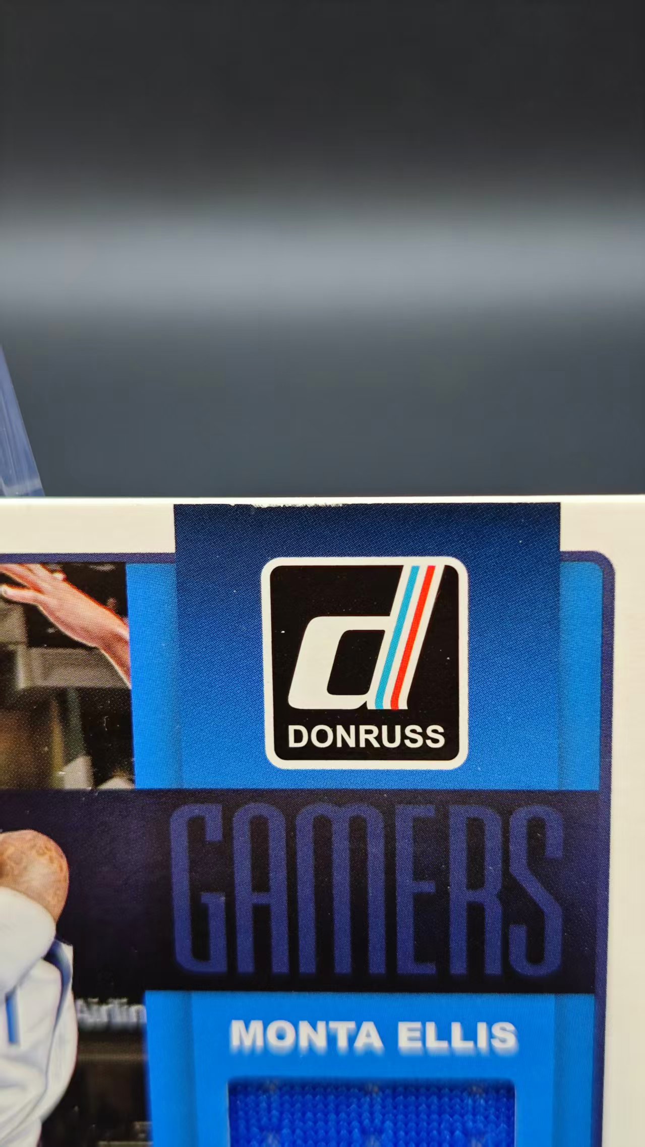 【六六代卖】2014-15 Panini Donruss Monta Ellis 杜蕾斯 独行侠 艾利斯 小窗球衣 切割 瑕疵如图(炜炜N)WL