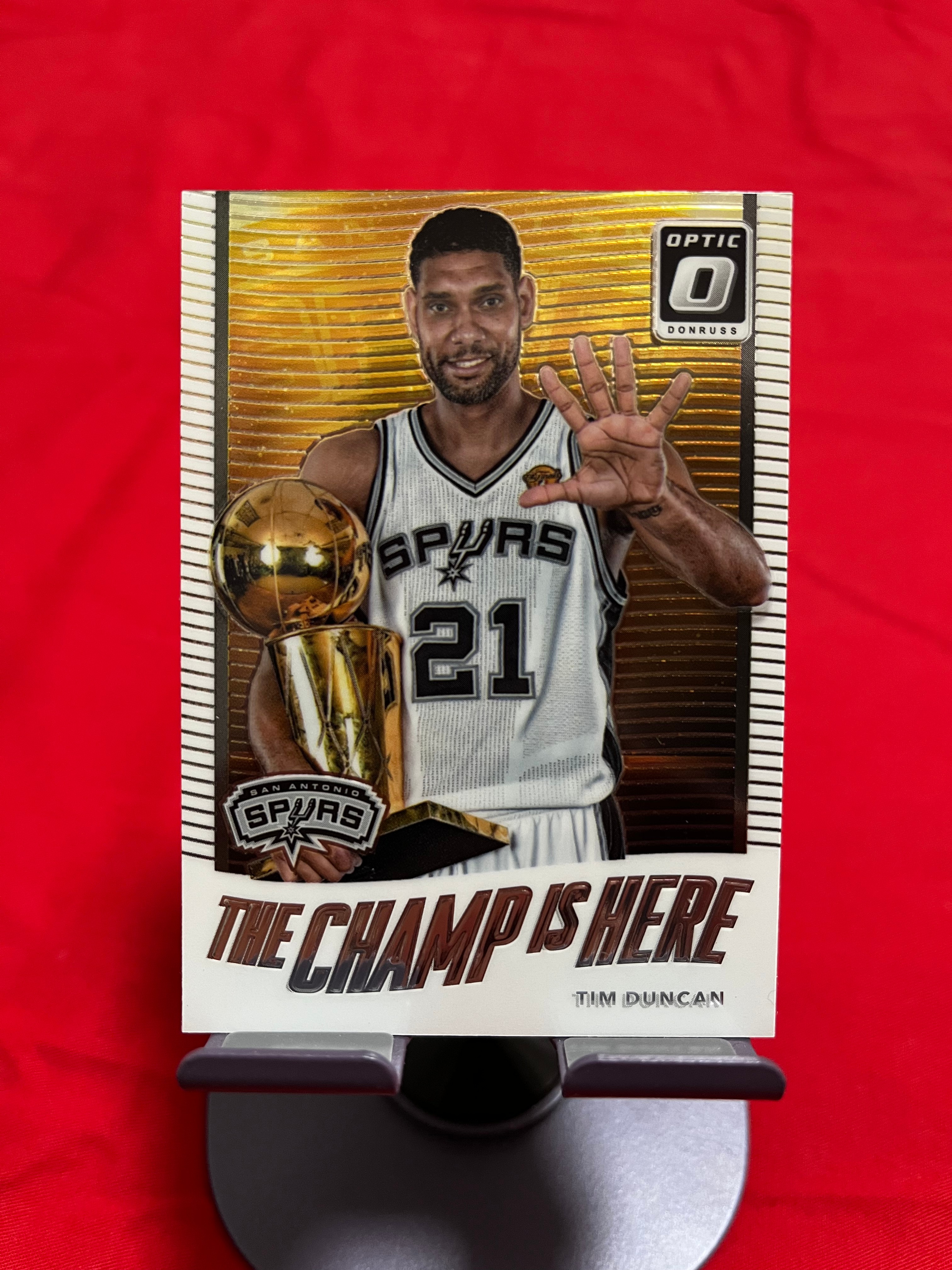 2017-18 Panini Optic Tim Duncan 蒂姆 邓肯 石佛 马刺【捧杯特卡 THE CHAMP IS HERE 杜蕾斯】【边角瑕疵如图 介意勿拍】#1128