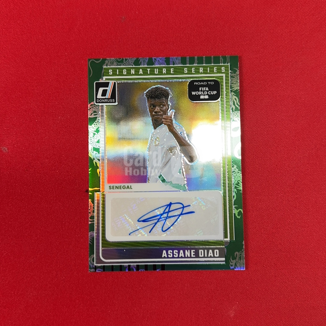 【四喜代拍】2025-26 Panini Donruss 世界杯 杜蕾斯 阿萨内 迪奥 Assane Diao 塞内加尔 34/49编 签字  绿龙鱗折 卡品如图（polo）