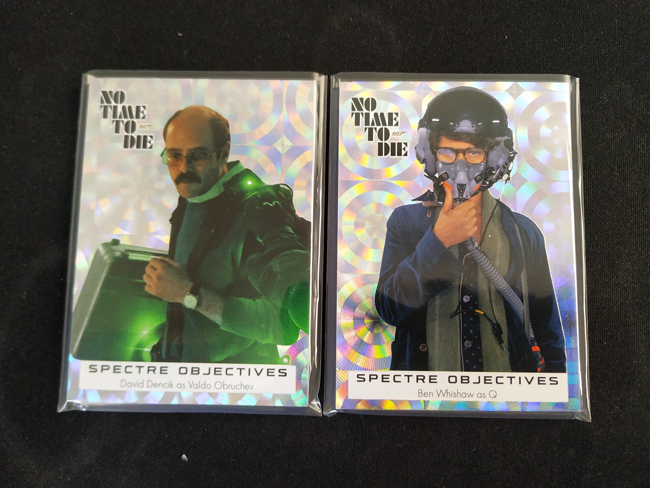 10-23 wgogsup 156 【钢蛋儿拍卖】 UD 2025 007 No Time To Die 无暇赴死 2张 Spectre Objectives 特卡 银折 Q 瓦尔多 奥布鲁切夫 Valdo Obruchev 卡品如图