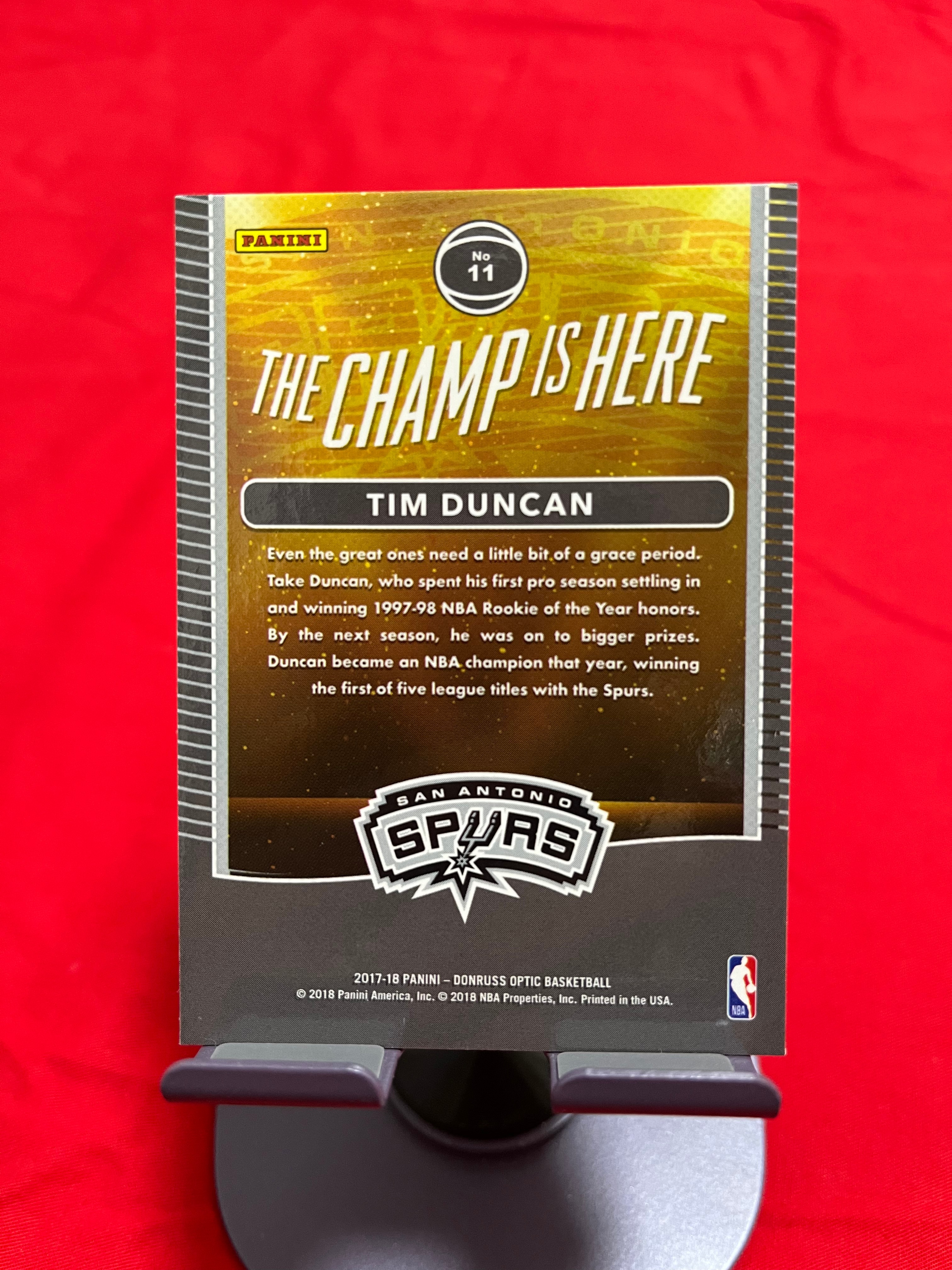 2017-18 Panini Optic Tim Duncan 蒂姆 邓肯 石佛 马刺【捧杯特卡 THE CHAMP IS HERE 杜蕾斯】【边角瑕疵如图 介意勿拍】#1128