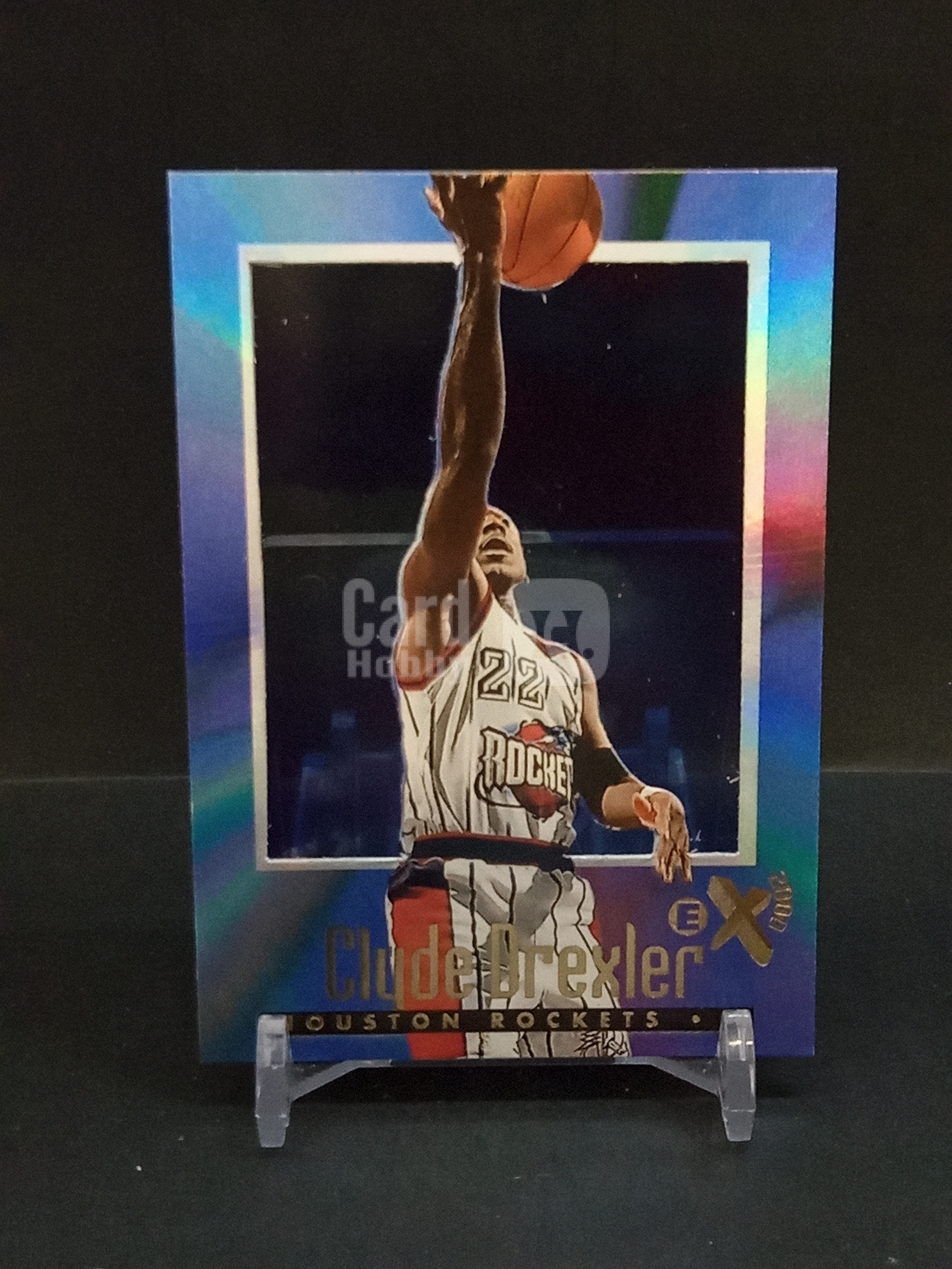 【DC拍卖】9.29小科比(微瑕)`1996-97 Skybox E-X2000 #24 Clyde Drexler 克莱德德雷克斯勒 休斯顿火箭 蓝彩渐变胶片折射老球星卡`