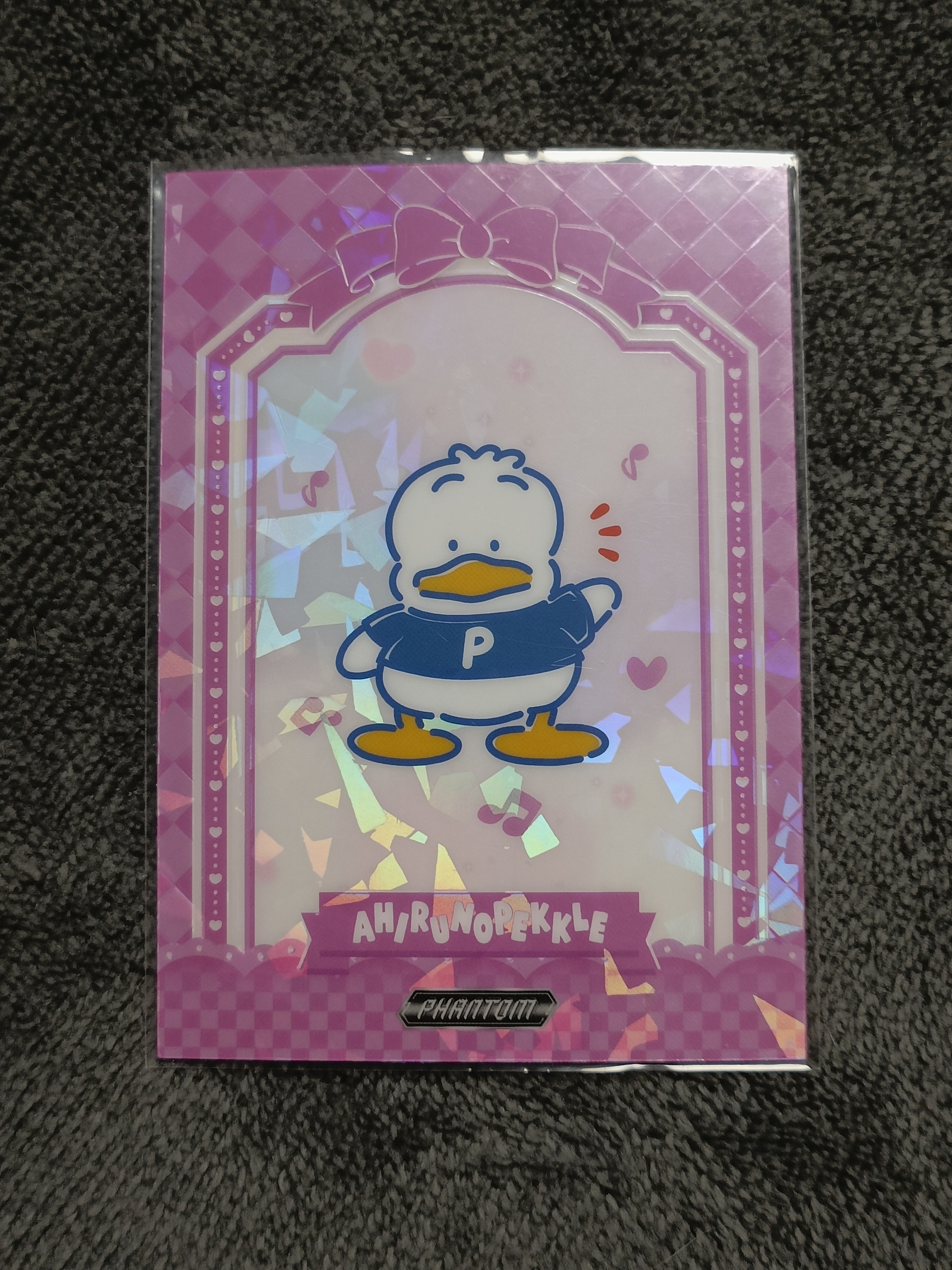 2023 Kakawow PHANTOM 三丽鸥家族系列收藏卡 AHIRUNOPELLE 贝克鸭 【谦谦拍卖】PSA-IPU-12 紫折 036/115编 秋鹿